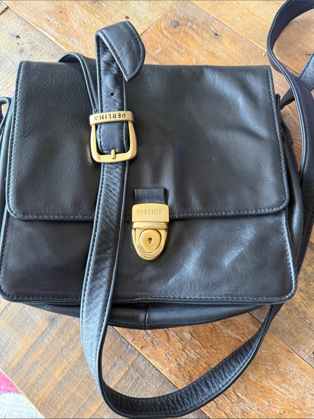 Perlina Black Leather Crossbody with Gold Buckle and Lock